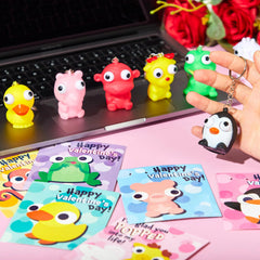 28 Packs Valentine's Day Gift Cards with Pop-Up Eyes Animal Keychains for Classroom Exchange Prizes