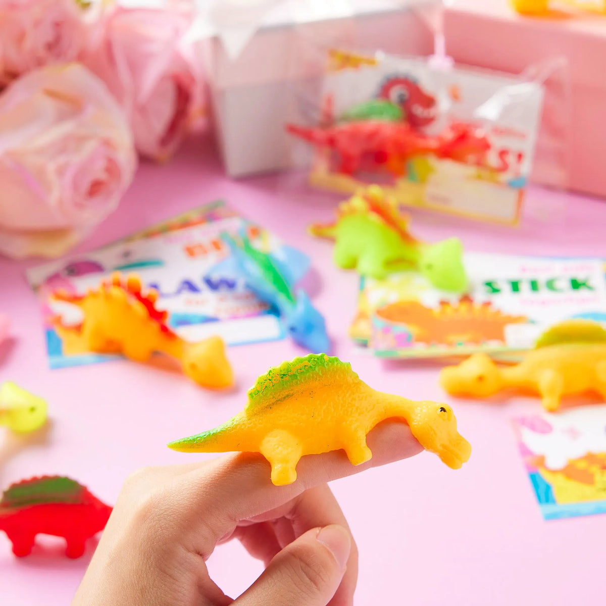 JOYIN 28 Pcs Valentine's Day Slingshot Dinosaur Toys with Cards